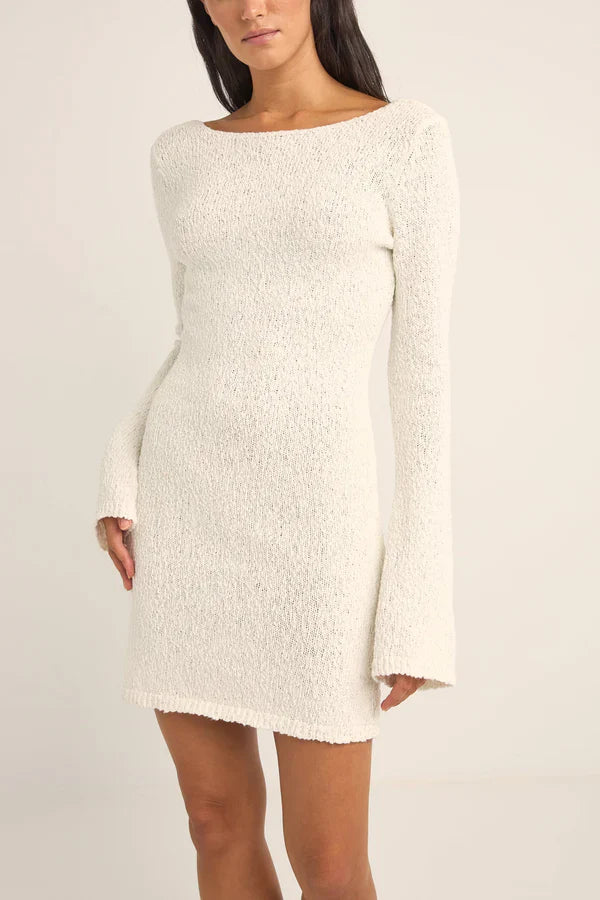 woman wearing a white rhythm adele knit mini dress