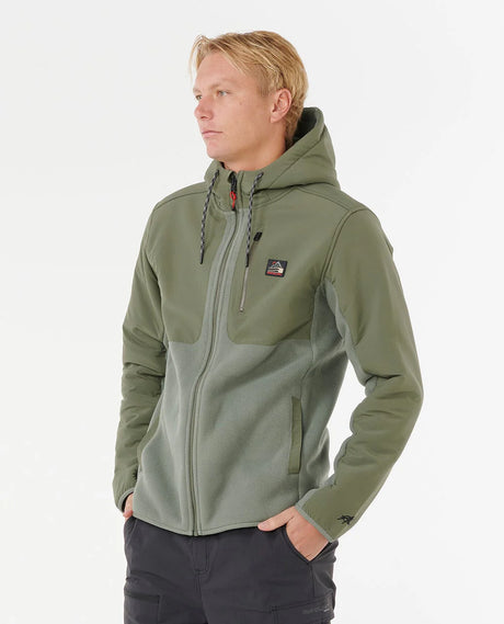 Man wearing a rip curl anti series fleece green jacket with a brand logo on a white background