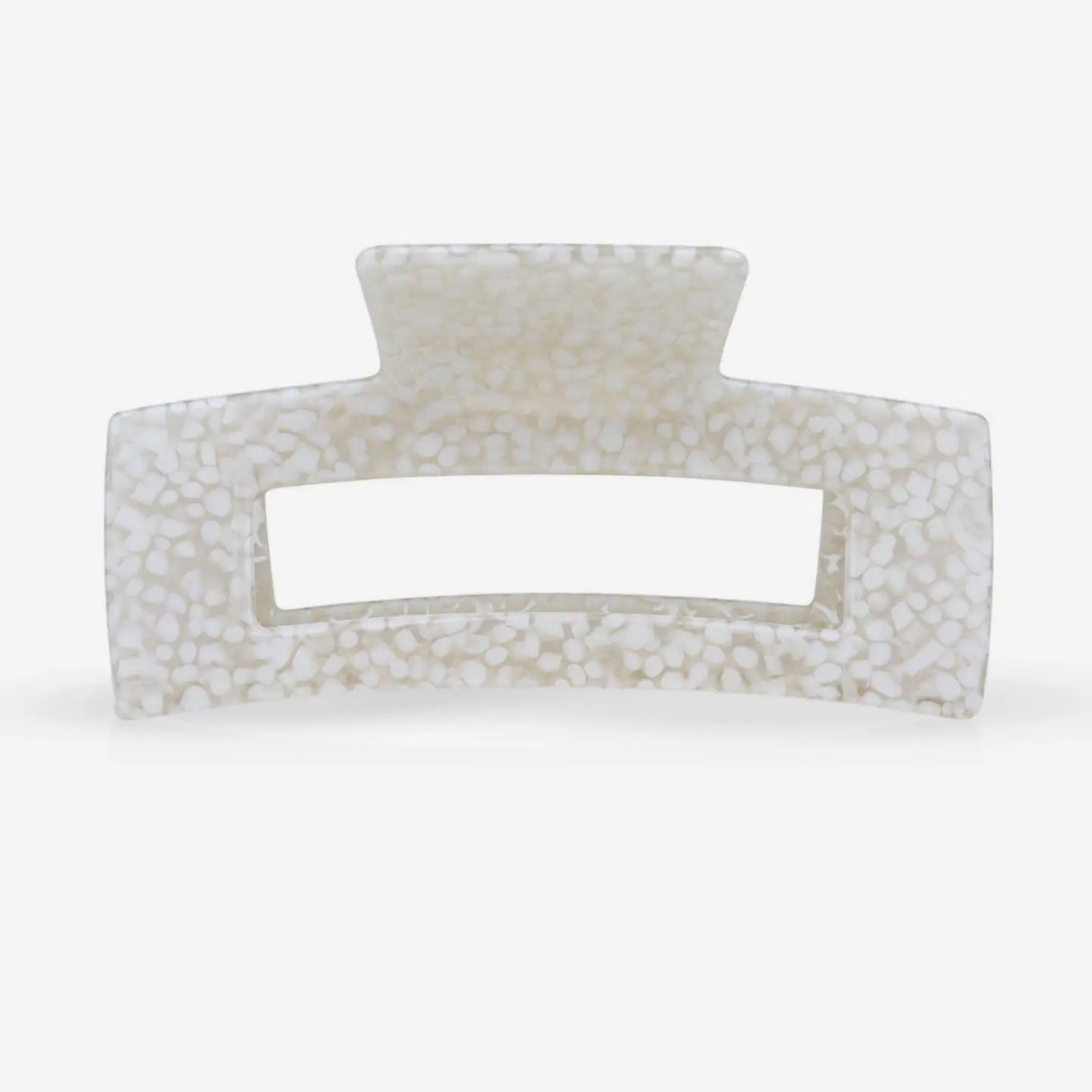 Rectangular hair clip with textured surface on a white background