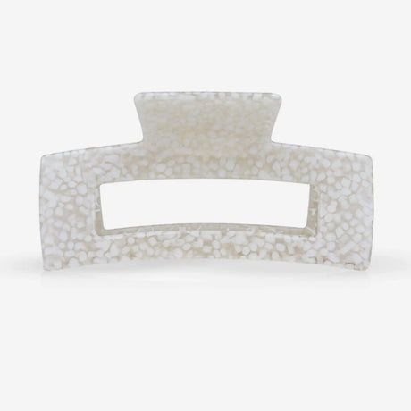 Rectangular hair clip with textured surface on a white background