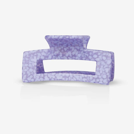 A sasstie recycled plastic purple hair clip on a white background
