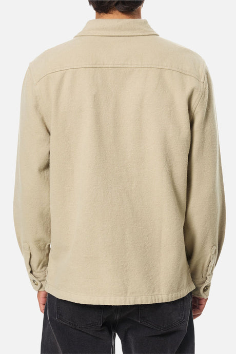 the back of a man wearing a katin shiloh flannel shirt