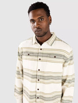 Man wearing a katin sierra flannel shirt in grey on a white background