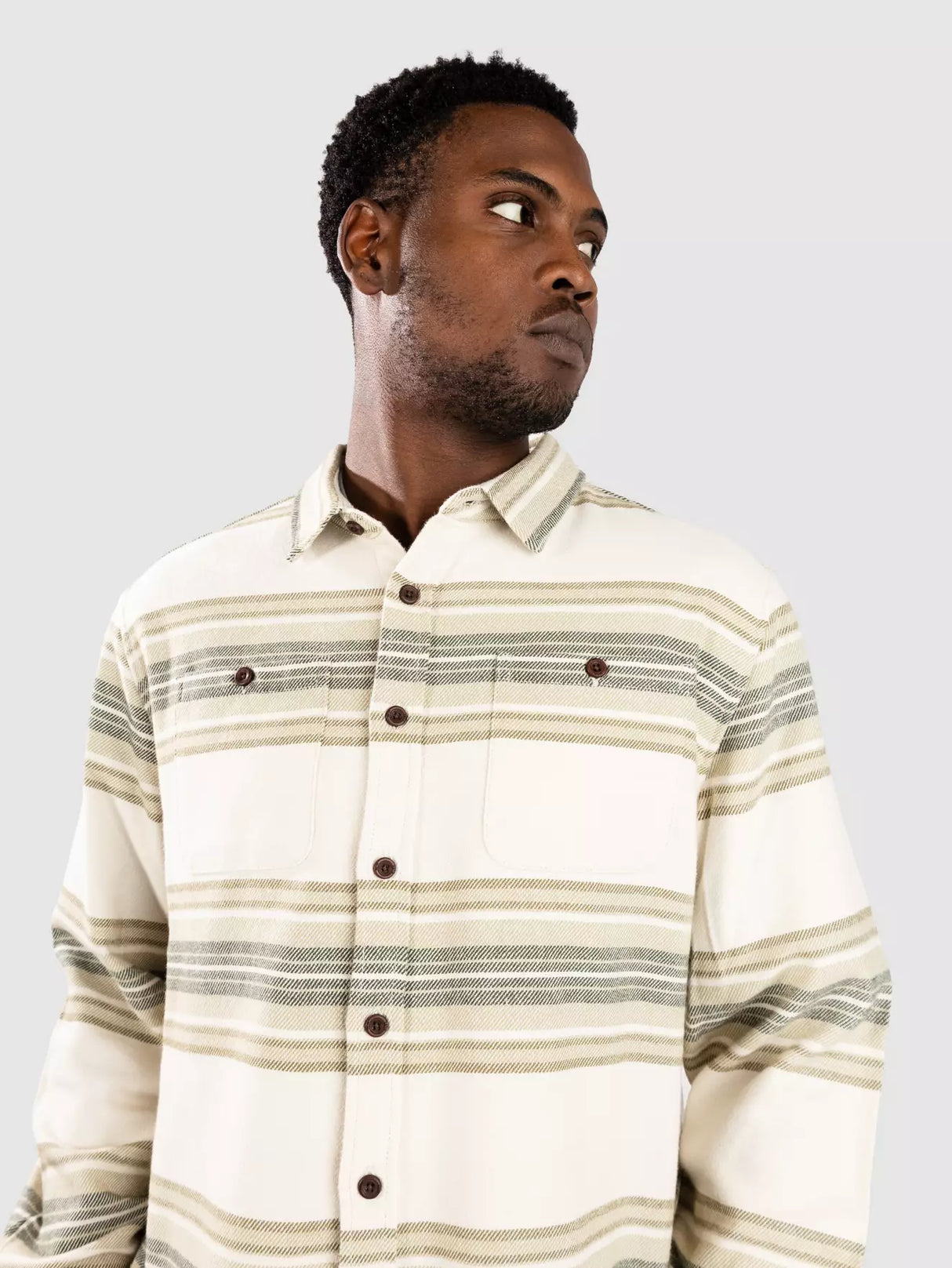 Man wearing a grey katin sierra flannel shirt