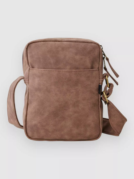 Rip Curl Brown leather crossbody bag on a light gray background