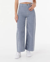 woman wearing a pair of rip curl stevie corduroy trousers
