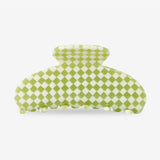 Sasstie harmony basil hair clip on a white background