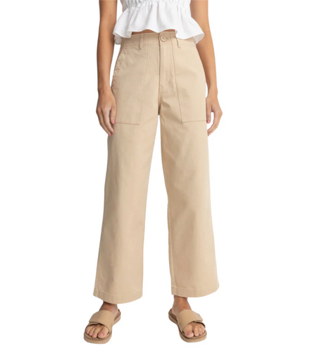 woman wearing rhythm fatigue natural coloured wide-leg pants on a white background
