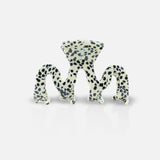 Polka dot recycled plastic hair clip on a white background